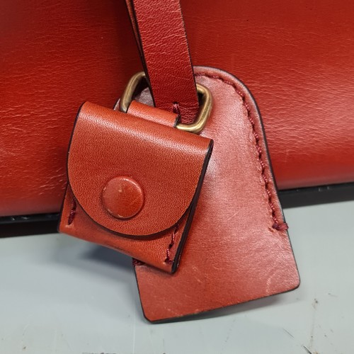 83 - Star Lot : A fabulous designer ladies handbag by Chloé brand. Designed in a scarlet red soft box cal... 