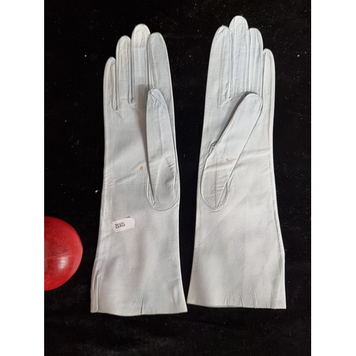 72 - A stunning pair of vintage pale blue Christian Dior genuine leather women's gloves. Stamped to inter... 