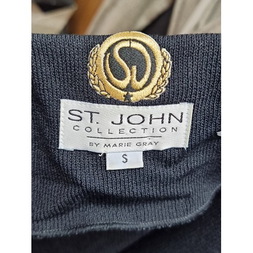 190 - A striking ladies cardigan in a heavy knit from the St. John by Marie Gray. Designed in a heavy blac... 