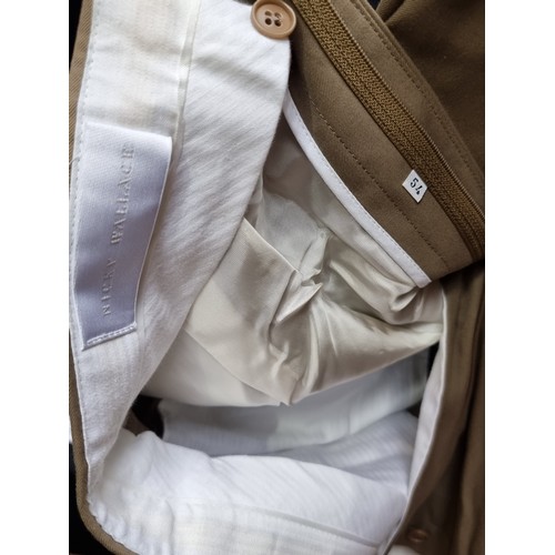 119 - A pair of tan Nicky Wallace Italian made men's suit trousers, brand new with original tags intact. E... 