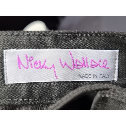 124 - A pair of black denim Nicky Wallace men's chino trousers. Italian made and brand new with original t... 