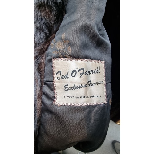 134 - Star lot : A wonderful women's full length genuine fur coat with beautiful lining to interior with d... 