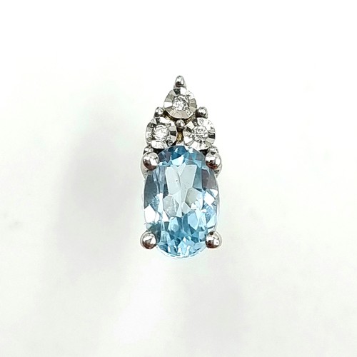 238 - Star Lot: A beautiful pair of 9 carat White Gold Diamond and Aquamarine stud earrings. These example... 