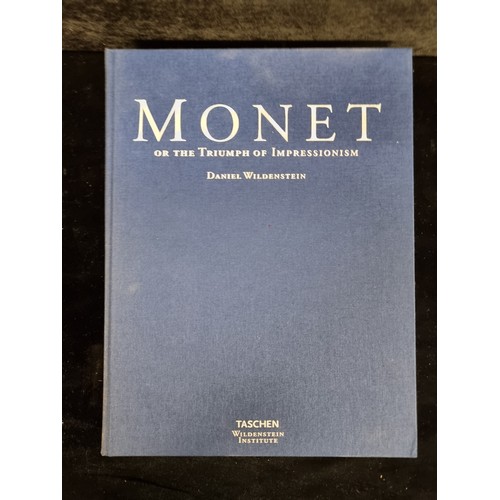 280 - A very large four volume hardback compendium of Monet compiled by Daniel Wildenstein and published b... 