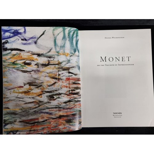 280 - A very large four volume hardback compendium of Monet compiled by Daniel Wildenstein and published b... 