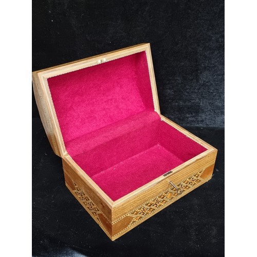 305 - A very attractive vintage wooden jewellery box inlaid with mother of pearl and brightly coloured str... 