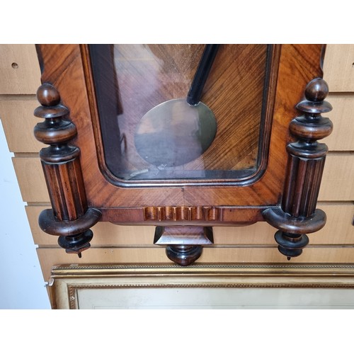 345 - Star Lot : A very handsome example of a large rectangular 8-day wall clock housed in a wooden case w... 