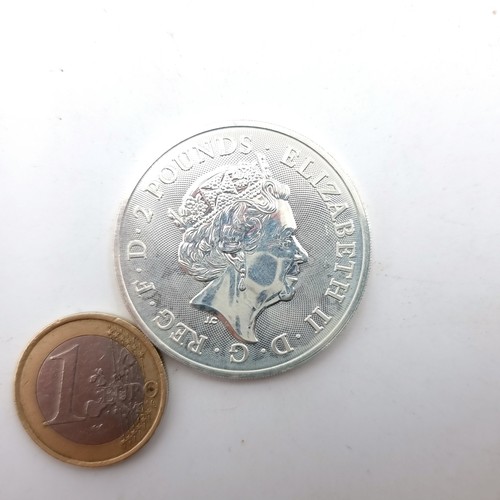 846 - A Queen Elizabeth 2 pound one ounce fine silver coin, circa 2019.  In mint condition.