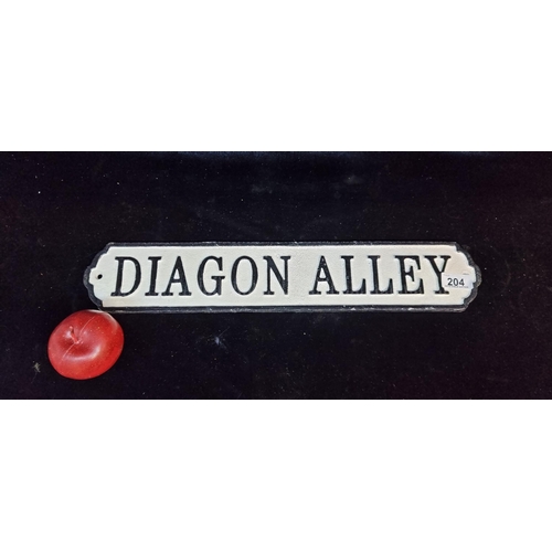 204 - A heavy cast metal sign reading ''Diagon Alley'' in the finger pointing style. Referring to the wiza... 