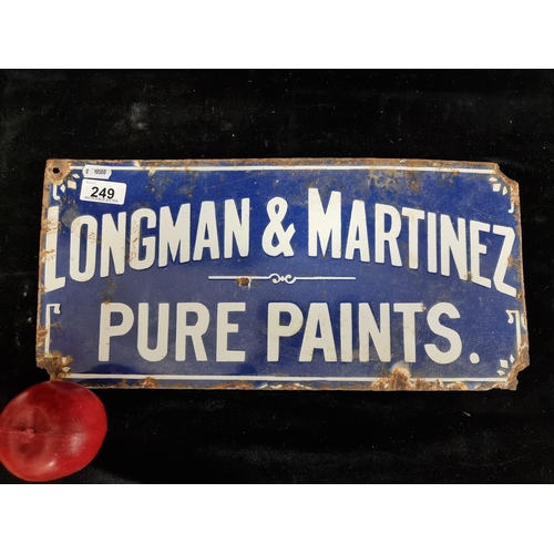 249 - A vintage heavy cast metal enamel sign advertising 