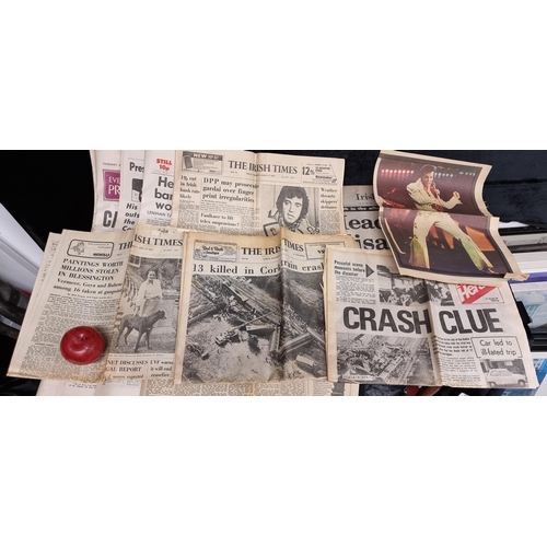 252 - A collection of seven original vintage Irish newspapers including headlines covering the death of 