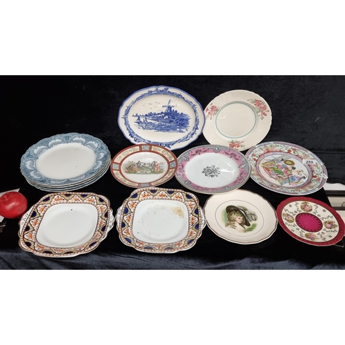 259 - A selection of thirteen antique plates including a blue and white Norfolk serving dish, a Japanese p... 