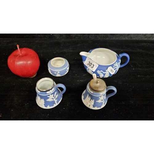 303 - Four examples of Wedgewood fine porcelain with traditional blue and white neoclassical cameos. Inclu... 