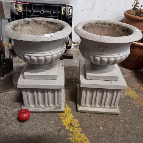 750 - A pair of reconstituted stone urn planters. Perfect for flanking a front door. H53cm x D36cm `Nice a... 