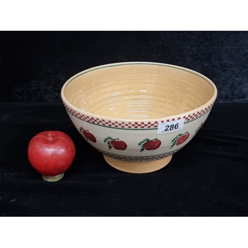 286 - A beautiful example of Nicholas Moss Irish pottery in the form of a large fruit bowl with apple moti... 