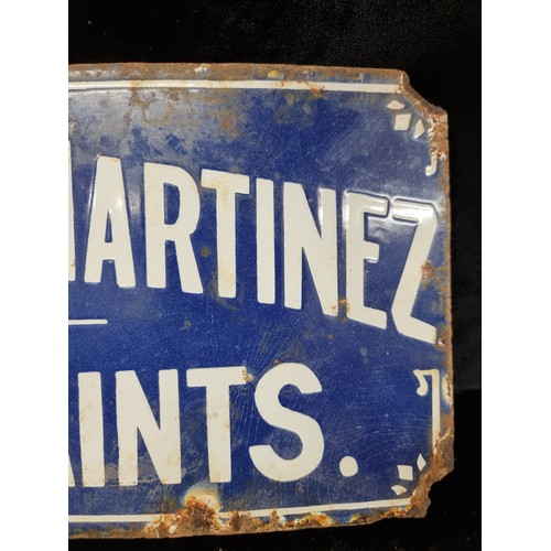 249 - A vintage heavy cast metal enamel sign advertising 