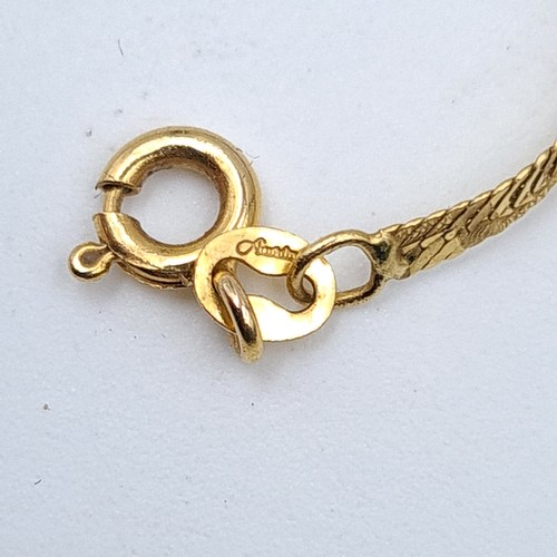 36 - A fine example of a 14 carat flat band gold chain necklace. Length of necklace: 44cm. Weight of gold... 