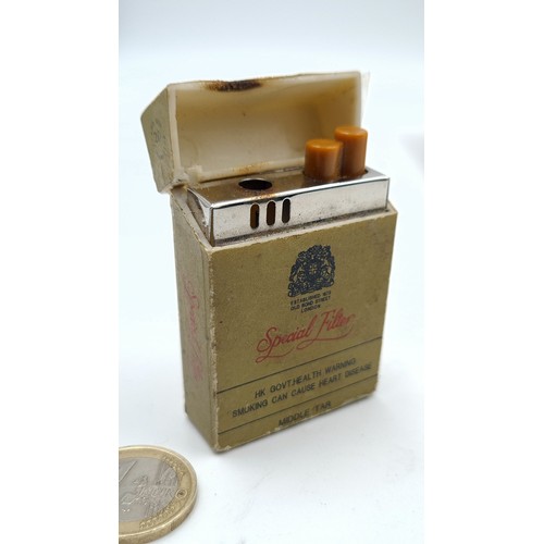 An excellent Benson & Hedges cigarette advertisement lighter. In excellent,  working order. Quirky ex