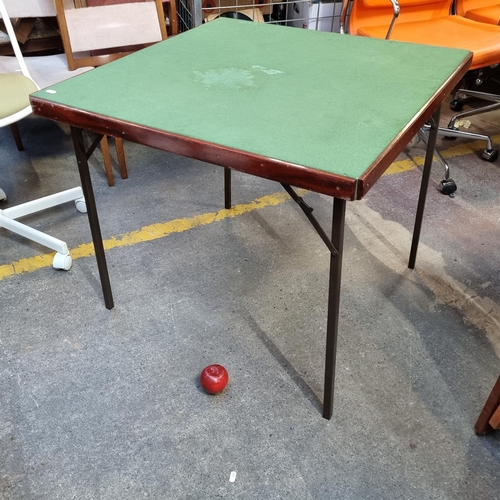 444 - A foldaway vintage wooden games table topped with a green baize fabric. Handy for a car boot sale or... 