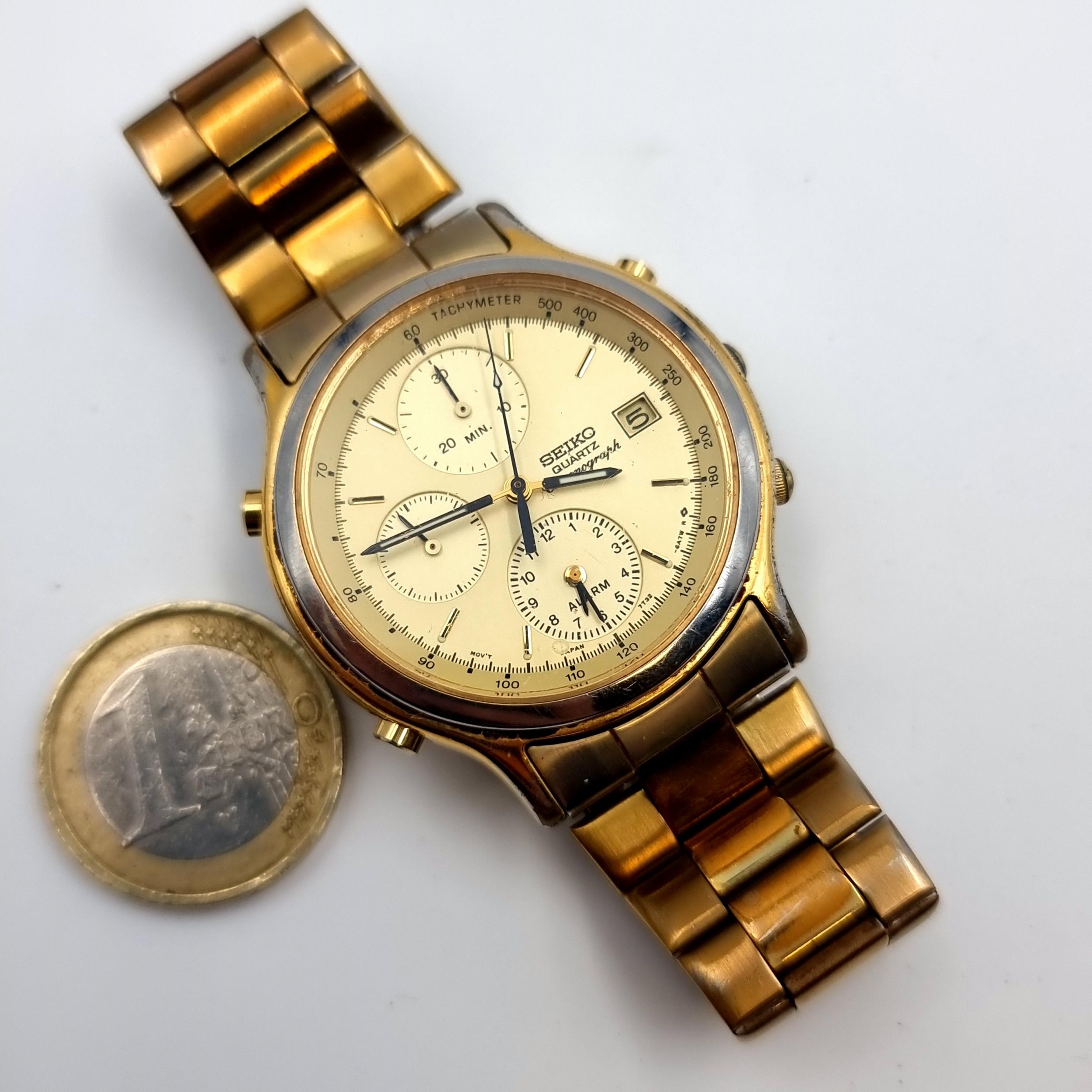 A Seiko quartz chronograph wristwatch set with baton dial, luminous hands  and sweep second hand with