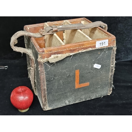 191 - A handsome antique shotgun cartridge case with leather strap handle, brass escutcheon and three neat... 