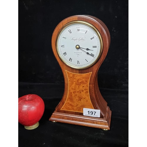 197 - A lovely Knight & Gibbins mantel clock. Of wonderful hourglass form with a solid wood case, convex g... 