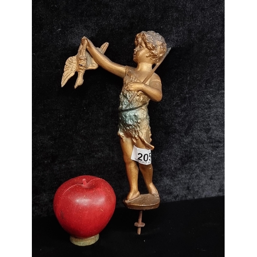 205 - A fabulous a antique  cold painted spelter figure of a young boy holding his prey aloft. With screw ... 