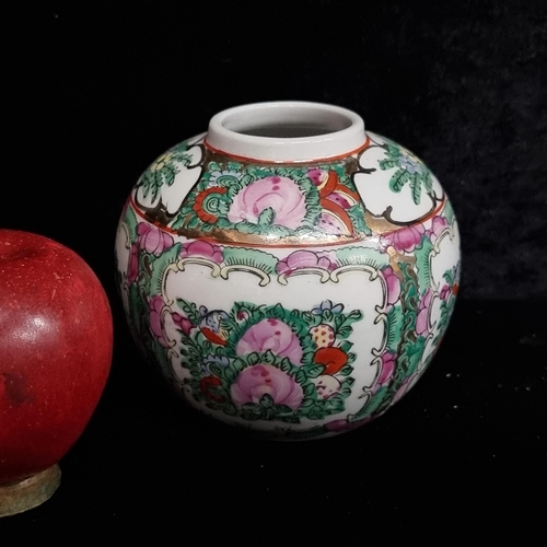 226 - A lovely vintage Japanese porcelain ware vase with profuse hand painted floral detail and gilt accen... 