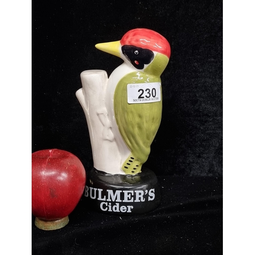 230 - A ceramic Bulmer's Irish Cider pub advertising woodpecker figure.