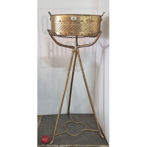 497 - Star Lot : A lovely eye-catching antique brass plant stand. With hammered fish scale pattern and lio... 