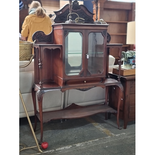 499 - Star lot : A fabulous Victorian mahogany display case. Furnished with four open shelves and one larg... 