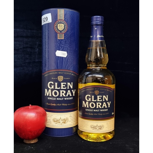 529 - A sealed bottle of Glen Moray Single Malt Whisky. Capacity 70cl. Supplied with a branded cask. Treat... 