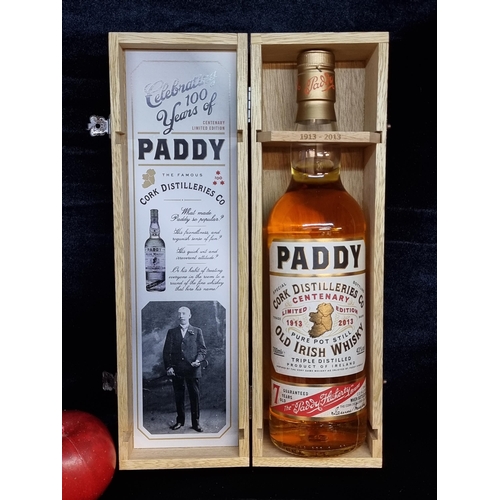 537 - A sealed bottle of Paddy Limited Edition Centenary bottle of Pure Pot Still Old Irish Whiskey. Celeb... 