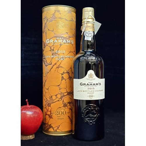 543 - A sealed bottle of 2015 Graham's Late Bottled Vintage Port. Supplied with a handsome marbled present... 