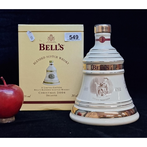 549 - A limited edition 2006 Bell's Blended Scotch Whiskey Christmas Decanter. Housed in a Wade branded po... 