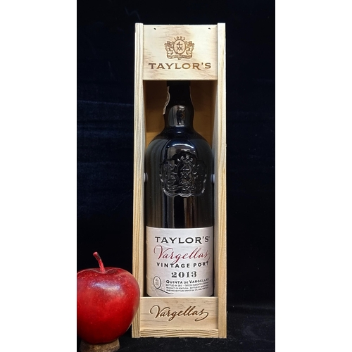 550 - A sealed bottle of 2013 Taylor's Vargellas Vintage Port. Capacity 75cl. Housed in a branded wooden p... 