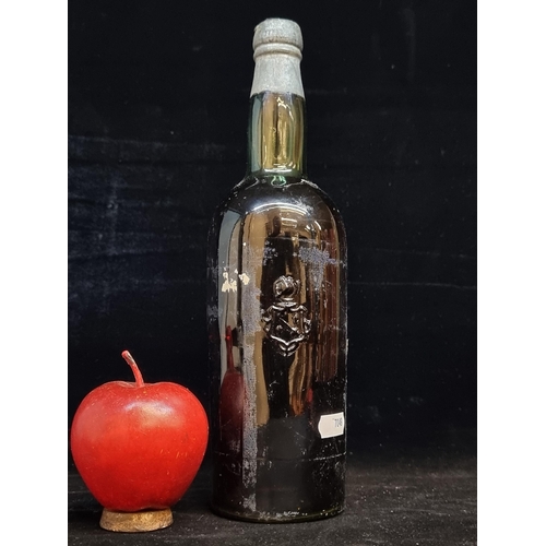 552 - A sealed vintage bottle of Pedro Domecq Fundador Spanish Brandy. No label but housed in a branded gl... 