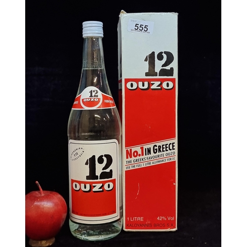 555 - A vintage 1979 sealed bottle of Greek 12 Ouzo. A 100cl / 1 Litre capacity bottle in original present... 