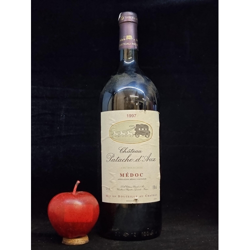 590 - A large sealed bottle of 1997 Chateau Patache d'Aux Médoc (150cl) with very little ullage and label ... 