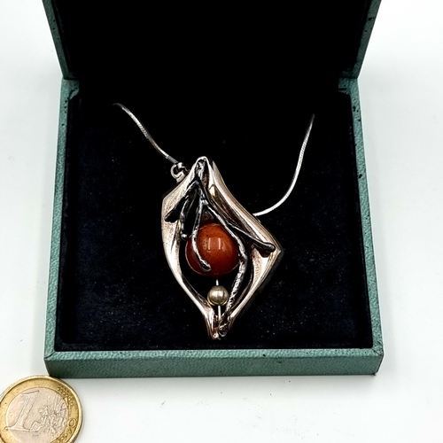 646 - An attractive goldstone drop pendant sterling silver necklace and chain in presentation box. 
Length... 