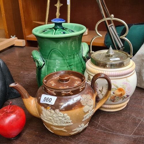 860 - Three ceramic items including a Royal Doulton Lambeth salt glaze teapot with applied moulds featurin... 