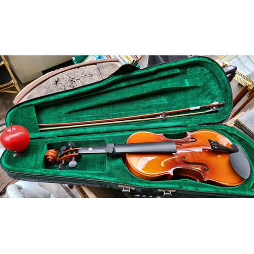 865 - A full size (4/4) Antoni Debut violin by John Hornby Skewes, along with a Valencia horsehair bow. Ac... 