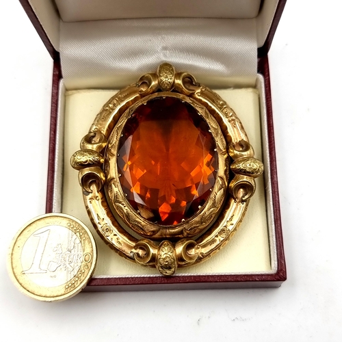 883 - A super antique pinchbeck framed brooch set with a dual stone swivel mount enabling either an amber ... 