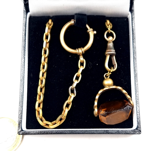 886 - An antique chain set with amber stone swivel fob. Chain has ring and lobster clasp.
Length of chain:... 