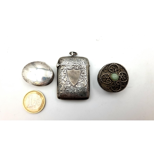 887 - Three antique Victorian silver items. A sterling silver Victorian vesta case hallmarked Birmingham 1... 