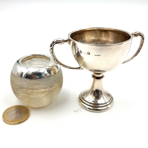 891 - Two sterling silver items consisting of a vintage challenge cup with date presentation 1945 hallmark... 