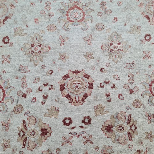 492 - A beautiful handwoven wool rug in elegant shades of cream, gold, terracotta and baby blue. L: 220cm ... 