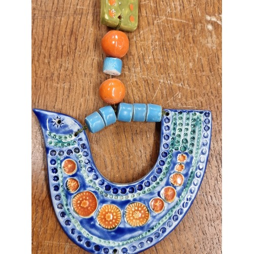 110 - Star Lot : A charming very rare eclectic ceramic mobile by John Ffrench for Arklow Studio Pottery. A... 