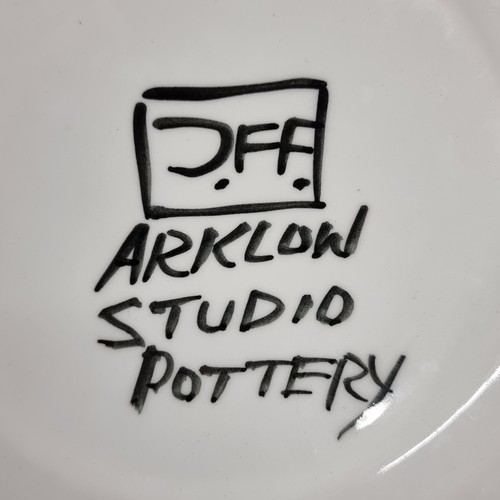 116 - Star lot : A gorgeous JFF (John Ffrench) Arklow Pottery plate. Designed in striking colours of amber... 