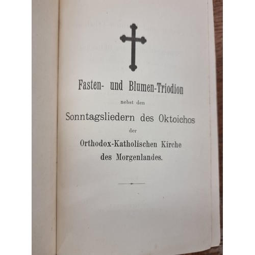 207 - Two antique hardback books including German translations of Orthodox Slavic text based on original G... 